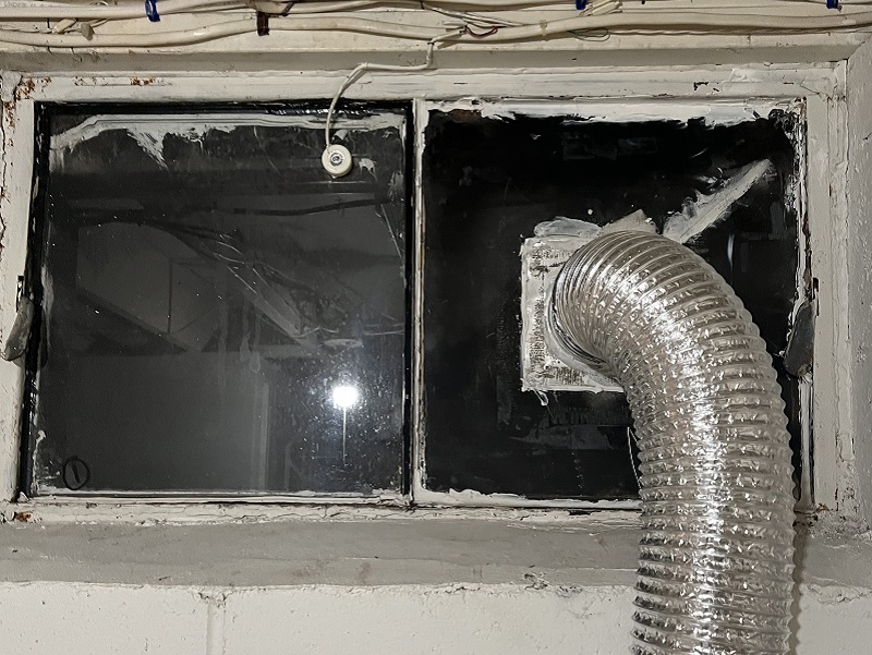 Basement window replacement with a dryer vent